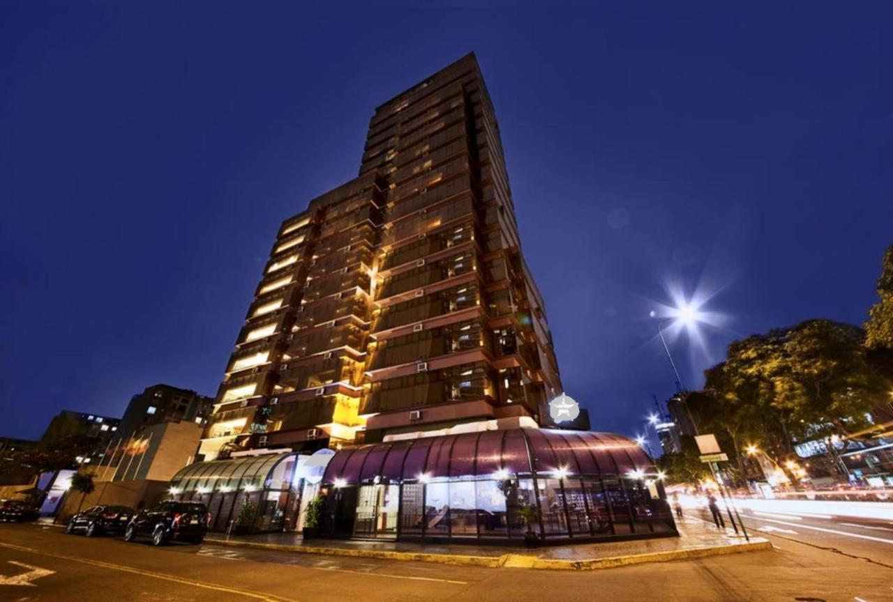 J&A Classic Hotel Lima Bagian luar foto The hotel at night